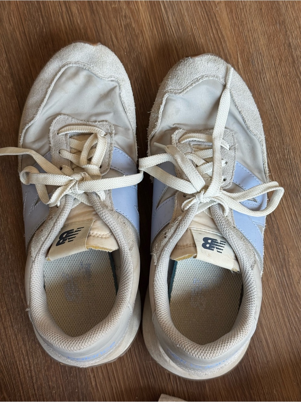 New Balance Women's Sneakers in Cream with Light Blue Accents
